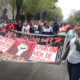 Con misa, marcha y pase de lista recuerdan a normalistas de Ayotzinapa