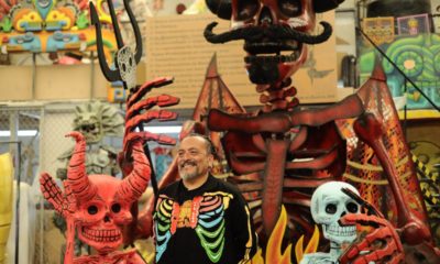 Artistas trabajan incansablemente en carros alegóricos para el Desfile de Día de Muertos